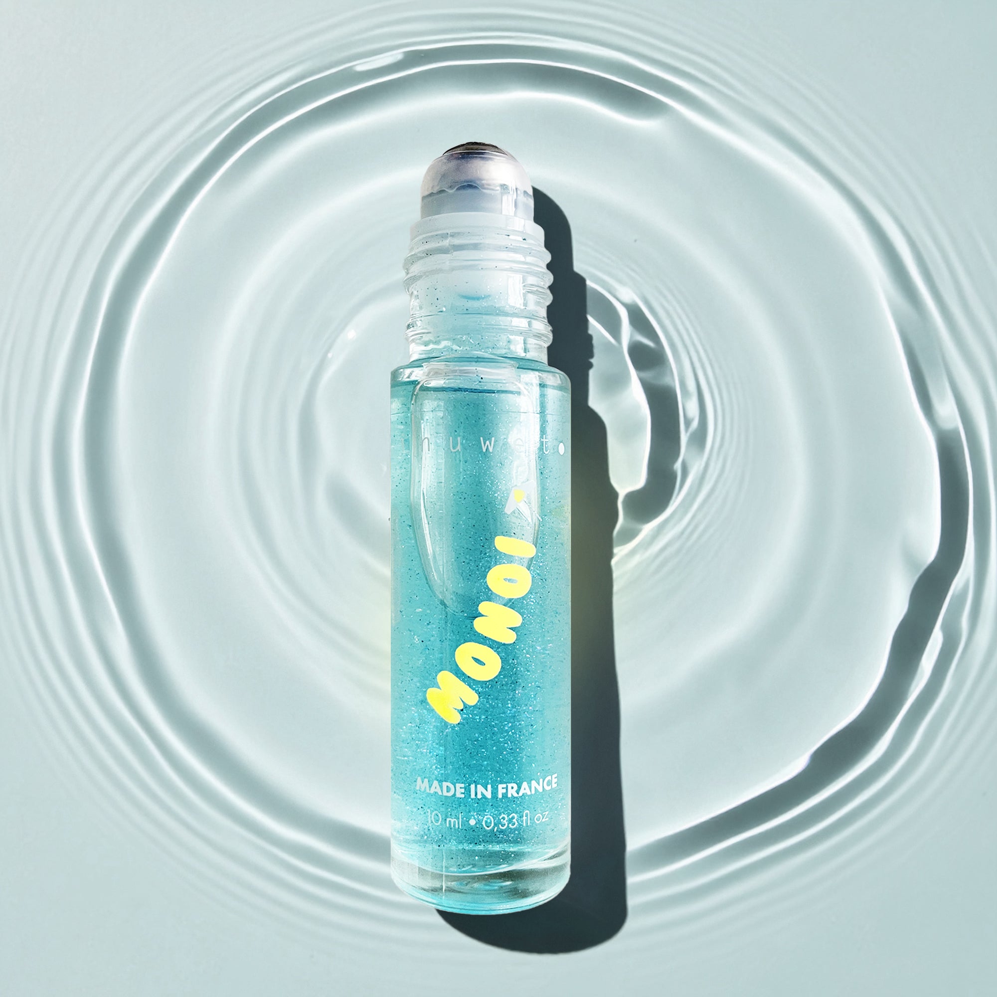 Parfum Roll-on Pailleté Monoï