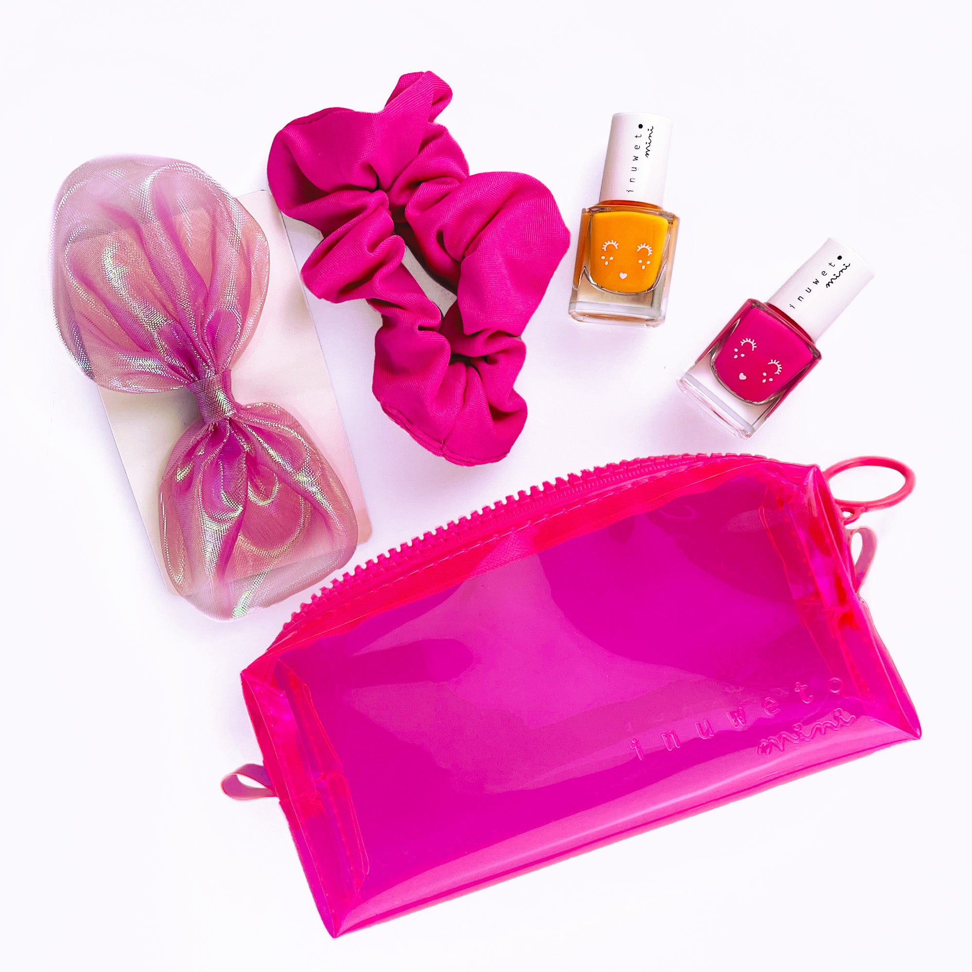 Trousse fluo rose : accessoires et vernis